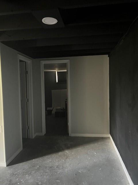 interior space featuring baseboards