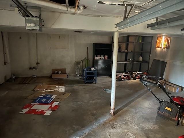 unfinished basement featuring a garage