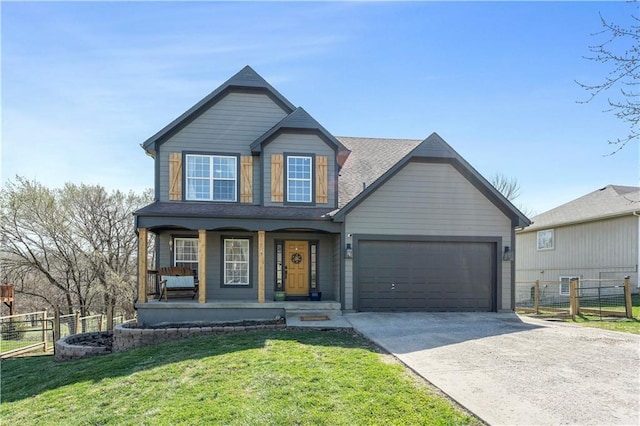 view of front of house featuring a porch, driveway, fence, a front lawn, and an attached garage