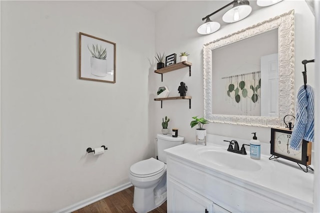 full bath with vanity, wood finished floors, toilet, baseboards, and a shower with curtain