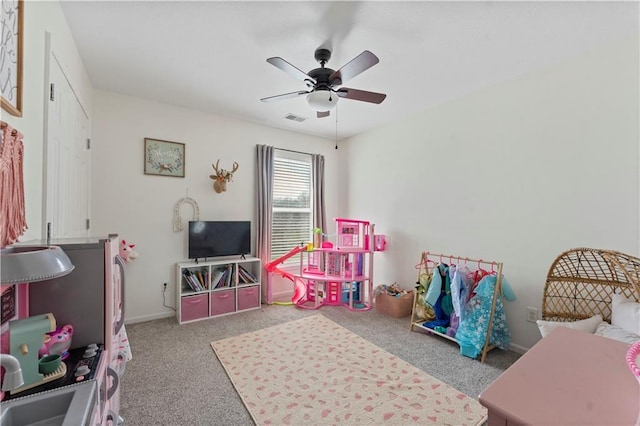 game room featuring carpet floors, ceiling fan, baseboards, and visible vents