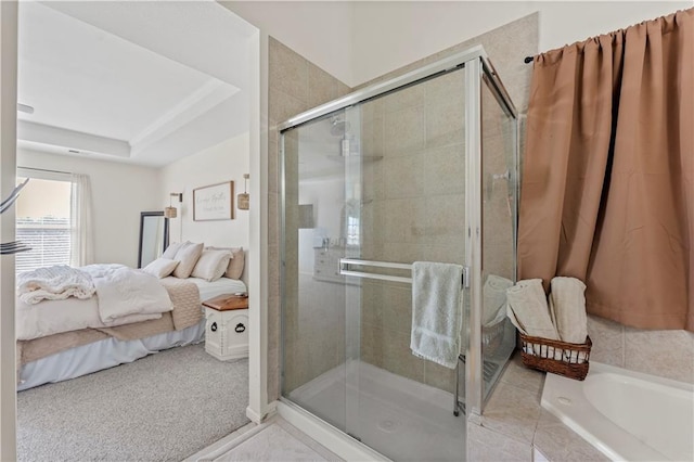 ensuite bathroom with a garden tub, a stall shower, and ensuite bath