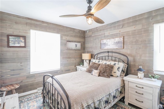 400 N Boardman St, Pleasant Hill, MO 64080 - bedroom featuring wood walls and ceiling fan
