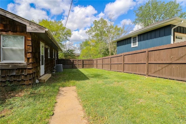 400 N Boardman St, Pleasant Hill, MO 64080 - view of yard featuring a fenced backyard and central AC unit