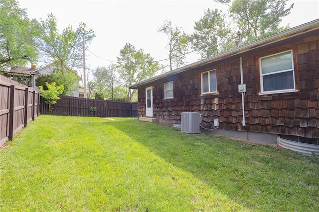 400 N Boardman St, Pleasant Hill, MO 64080 - view of yard with central air condition unit and a fenced backyard