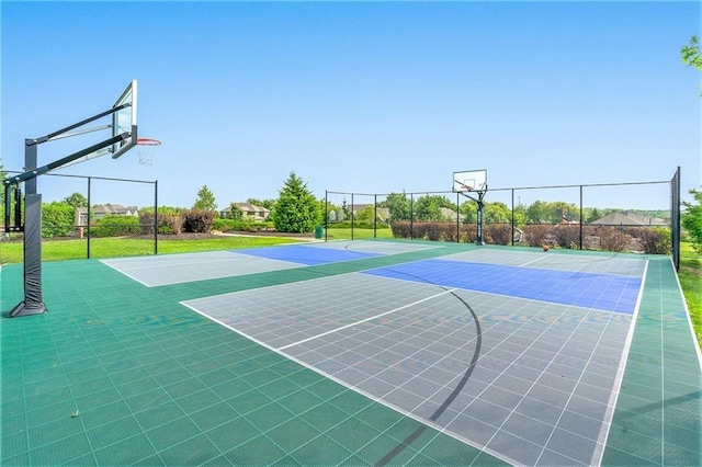 view of sport court with community basketball court and fence