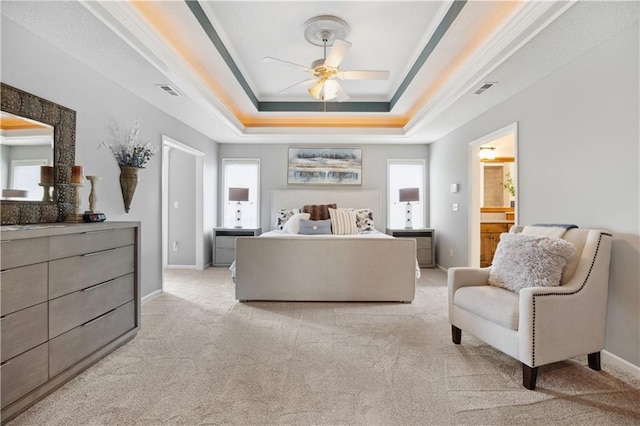 9924 Skyview Ln, Lenexa, KS 66220 - bedroom with a raised ceiling, multiple windows, light colored carpet, and baseboards