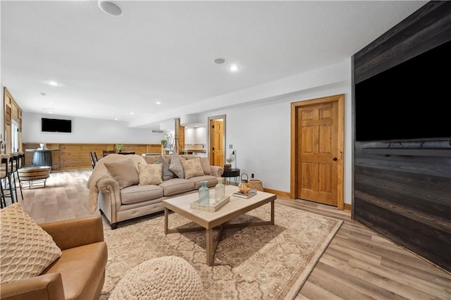 9924 Skyview Ln, Lenexa, KS 66220 - living room featuring light wood-type flooring, recessed lighting, and baseboards