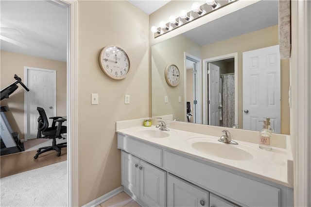 9924 Skyview Ln, Lenexa, KS 66220 - full bathroom with double vanity and baseboards