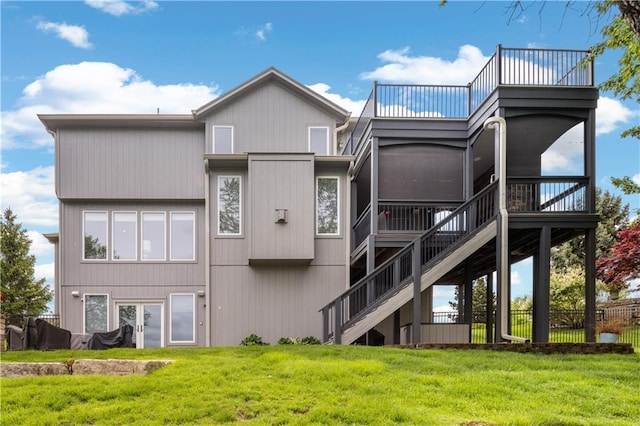 9924 Skyview Ln, Lenexa, KS 66220 - rear view of house with a sunroom and stairway