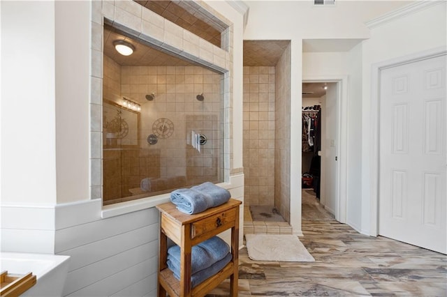 9924 Skyview Ln, Lenexa, KS 66220 - full bathroom with walk in shower, a spacious closet, and a soaking tub