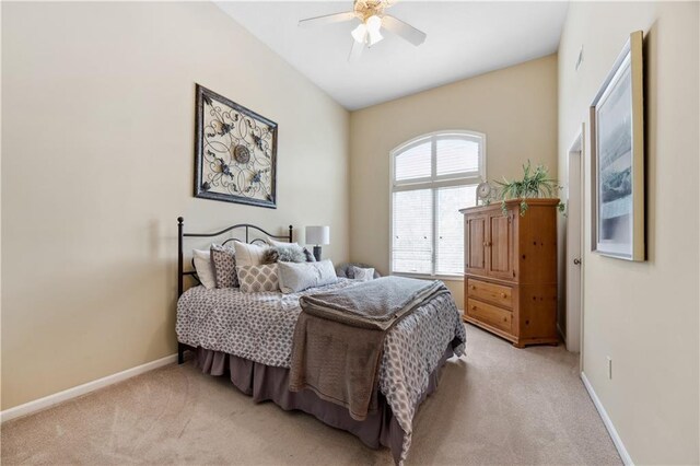 9924 Skyview Ln, Lenexa, KS 66220 - bedroom featuring light colored carpet, baseboards, and ceiling fan