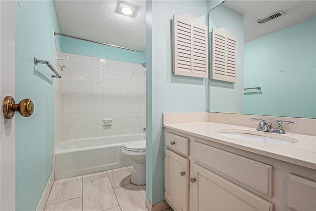 full bathroom with a textured ceiling, visible vents, vanity, toilet, and bathing tub / shower combination