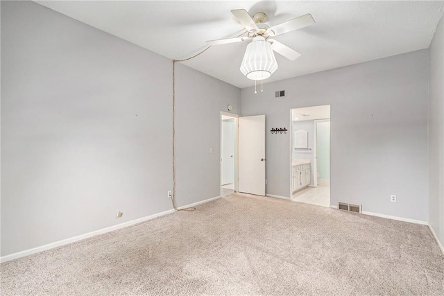 6724 W 109th St Unit F, Overland Park, KS 66211 - unfurnished bedroom featuring light colored carpet and ensuite bath