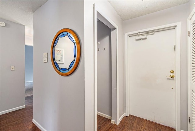 6724 W 109th St Unit F, Overland Park, KS 66211 - hall featuring wood finished floors and a textured ceiling