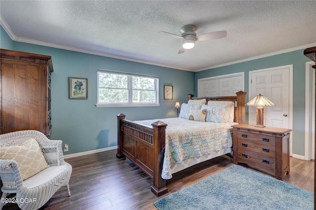 bedroom featuring baseboards, ornamental molding, and wood finished floors