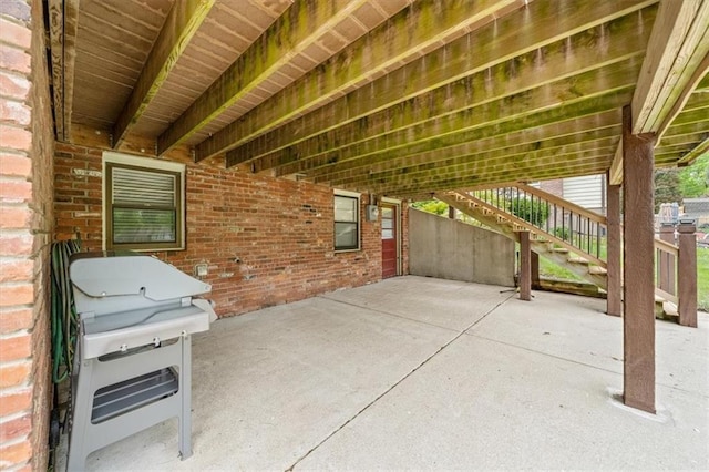view of patio featuring stairs and grilling area