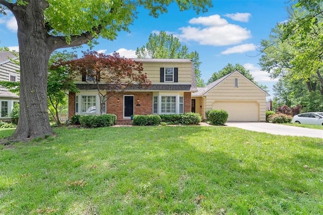 9817 Cedar St, Overland Park, KS 66207 - traditional-style house with an attached garage, brick siding, concrete driveway, and a front lawn