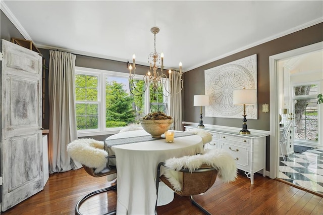 6116 W 61st Ter, Mission, KS 66202 - dining room featuring a chandelier, dark wood-style floors, and ornamental molding