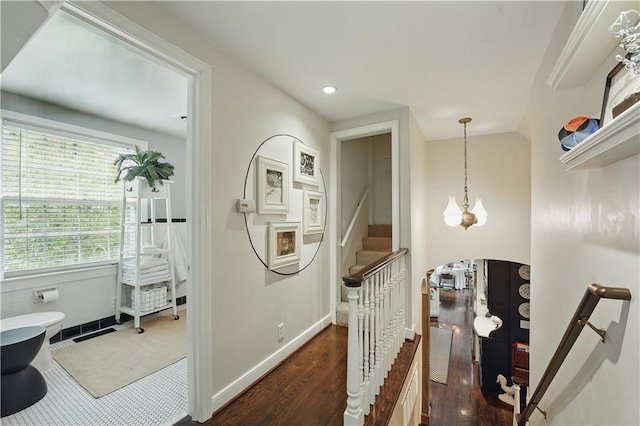 6116 W 61st Ter, Mission, KS 66202 - corridor with wood finished floors, recessed lighting, a chandelier, and stairs