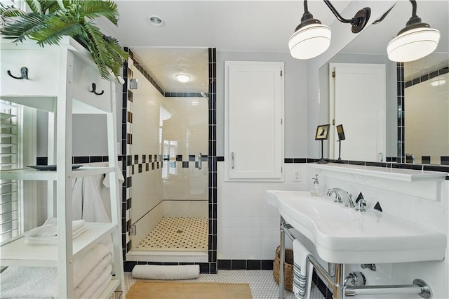 6116 W 61st Ter, Mission, KS 66202 - bathroom featuring a shower stall and tile walls