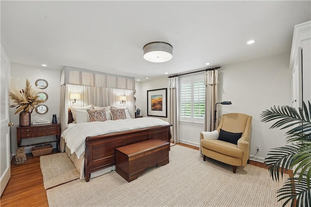 6116 W 61st Ter, Mission, KS 66202 - bedroom with wood finished floors, recessed lighting, and baseboards