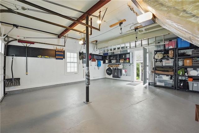 6116 W 61st Ter, Mission, KS 66202 - garage featuring a garage door opener
