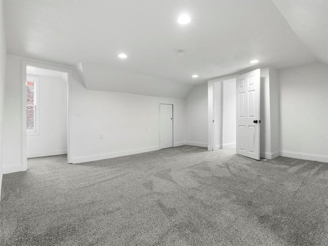 bonus room with recessed lighting, baseboards, carpet floors, and lofted ceiling