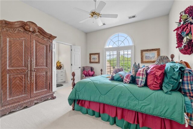 bedroom featuring ceiling fan, carpet floors, and visible vents