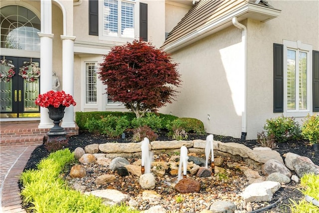 view of property exterior with stucco siding