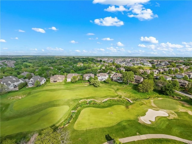 drone / aerial view featuring a residential view and view of golf course