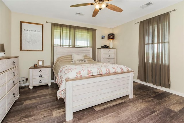 7934 SW James Lee Rd, Polo, MO 64671 - bedroom with dark wood finished floors and ceiling fan