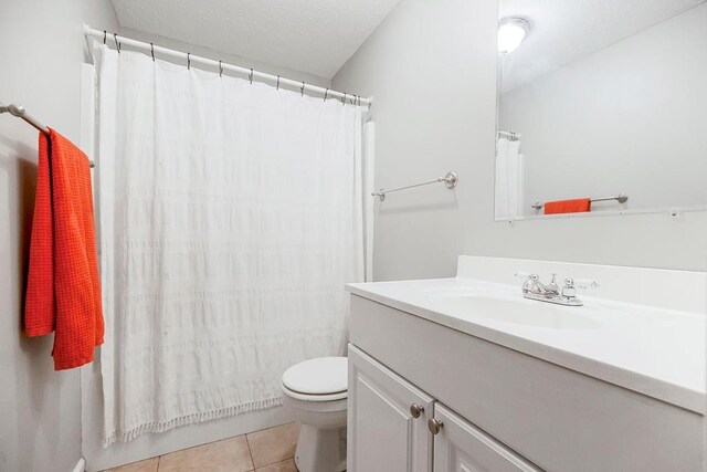7934 SW James Lee Rd, Polo, MO 64671 - bathroom featuring vanity, tile patterned floors, and a shower with curtain