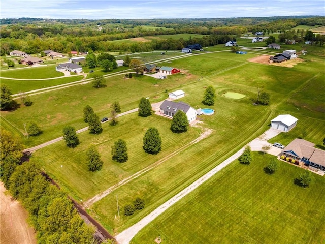birds eye view of property featuring a rural view