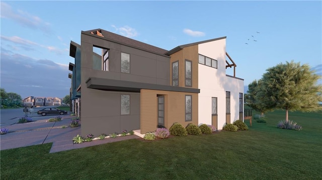 22582 W 93rd St, Lenexa, KS 66227 - view of side of property with a yard and stucco siding