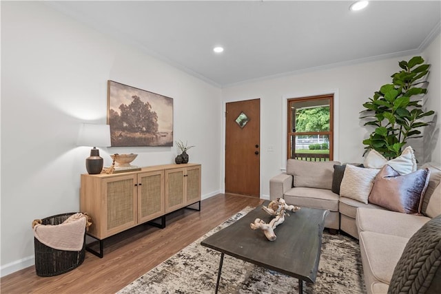 2521 W 47th Ter, Westwood, KS 66205 - living area with wood finished floors, crown molding, recessed lighting, and baseboards