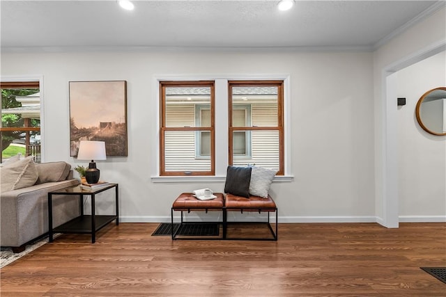 2521 W 47th Ter, Westwood, KS 66205 - living area with crown molding, wood finished floors, baseboards, and recessed lighting