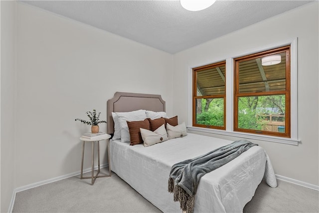 2521 W 47th Ter, Westwood, KS 66205 - bedroom featuring carpet flooring, baseboards, and a textured ceiling