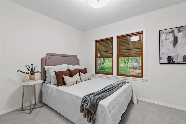2521 W 47th Ter, Westwood, KS 66205 - carpeted bedroom with baseboards and a textured ceiling