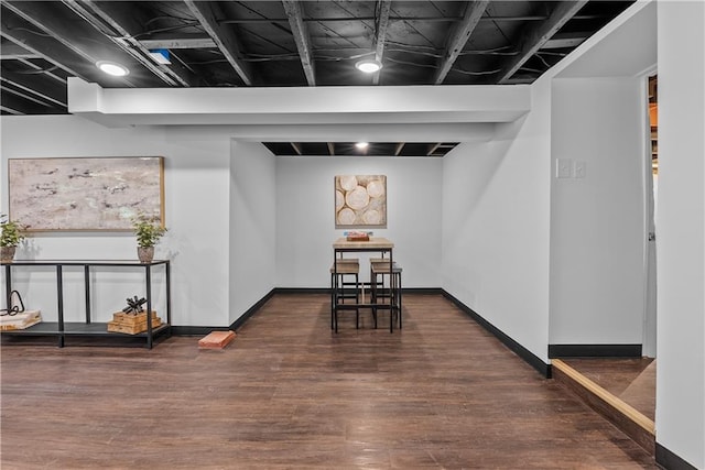 2521 W 47th Ter, Westwood, KS 66205 - finished basement featuring wood finished floors and baseboards