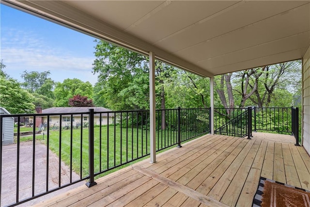 2521 W 47th Ter, Westwood, KS 66205 - deck featuring a yard and view of wooded area