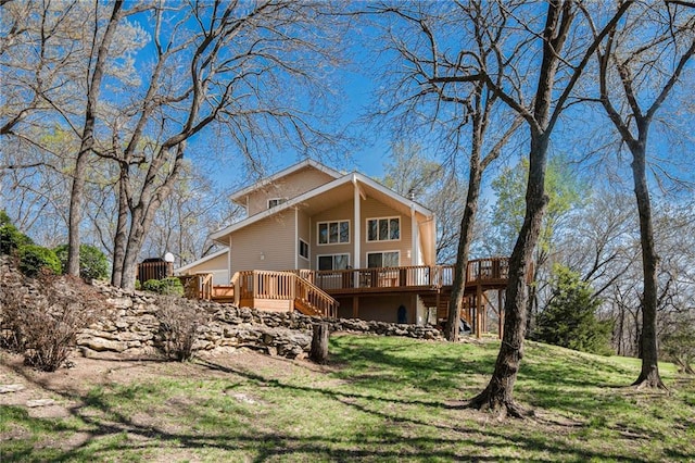 23801 Evans Rd, Tonganoxie, KS 66086 - rear view of house with stairs, a deck, and a yard