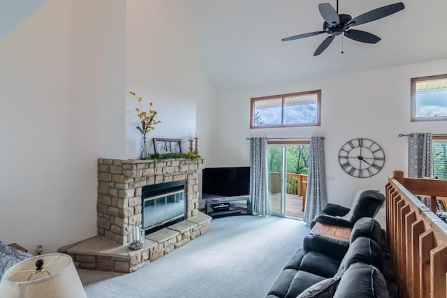 23801 Evans Rd, Tonganoxie, KS 66086 - carpeted living room featuring high vaulted ceiling, a ceiling fan, and a fireplace