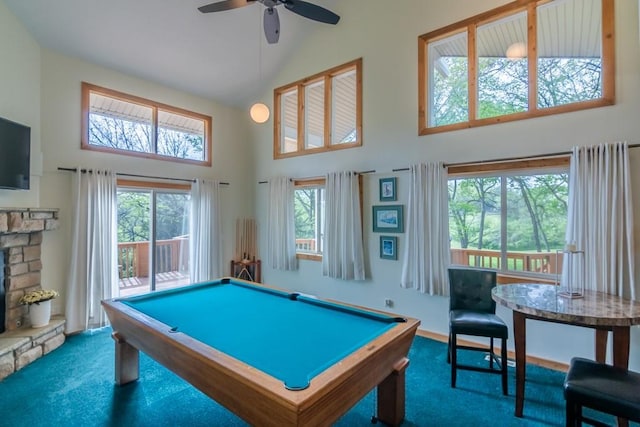23801 Evans Rd, Tonganoxie, KS 66086 - game room with high vaulted ceiling, carpet floors, a ceiling fan, billiards, and a stone fireplace