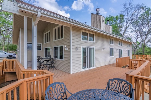 23801 Evans Rd, Tonganoxie, KS 66086 - wooden deck featuring outdoor dining area