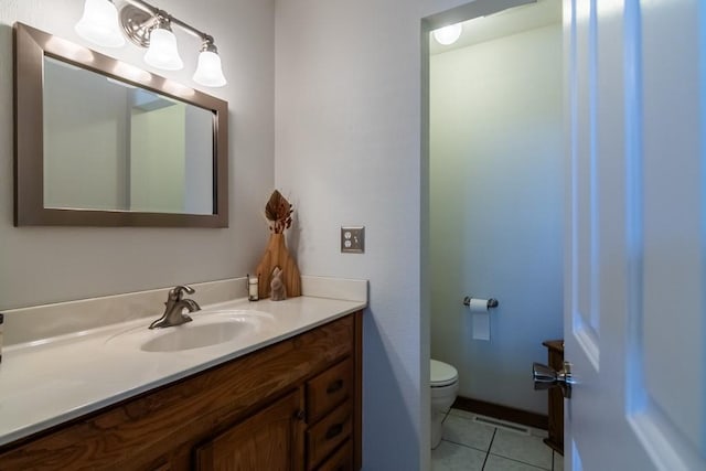 23801 Evans Rd, Tonganoxie, KS 66086 - bathroom with tile patterned flooring, toilet, and vanity