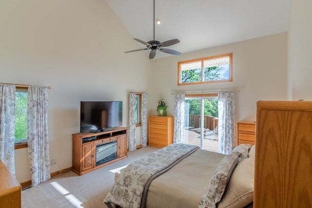 23801 Evans Rd, Tonganoxie, KS 66086 - bedroom with high vaulted ceiling, access to outside, light carpet, baseboards, and a ceiling fan