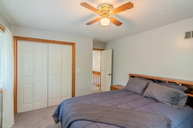 23801 Evans Rd, Tonganoxie, KS 66086 - bedroom featuring light colored carpet, a closet, and ceiling fan
