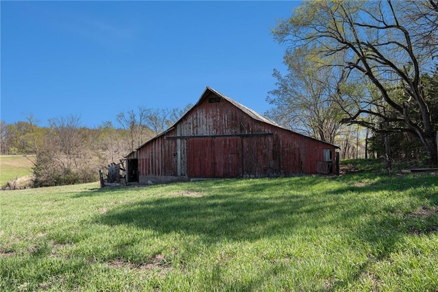 23801 Evans Rd, Tonganoxie, KS 66086 - view of barn featuring a lawn