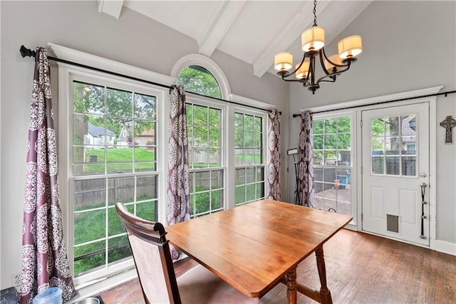 4504 NE 60th Ter, Kansas City, MO 64119 - dining room with an inviting chandelier, lofted ceiling with beams, and wood finished floors